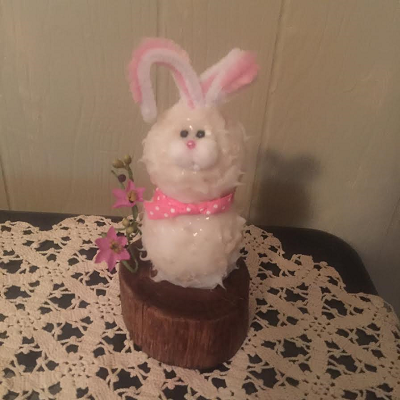 White Thumper Bunny Battery Operated Candle On A Log